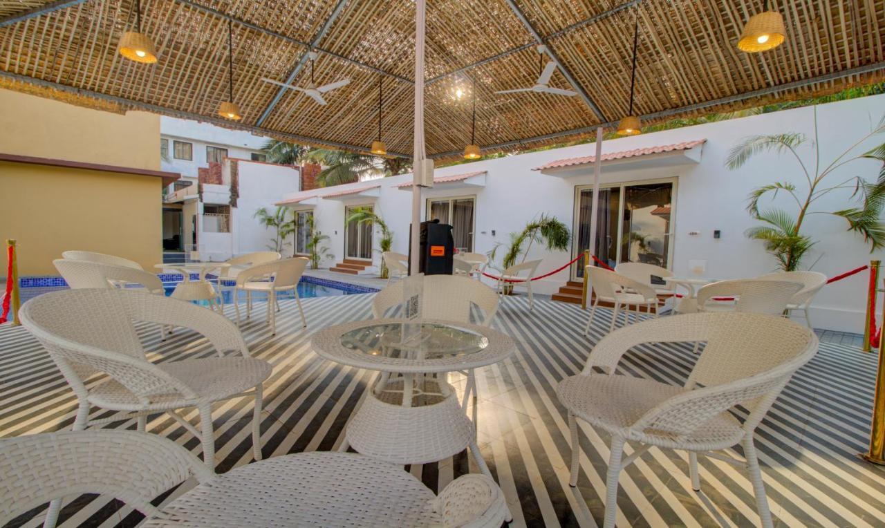 Treebo Code Red Hotel Morjim Ngoại thất bức ảnh